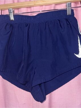 Nike Women's Dark Blue Athletic Shorts with White Swoosh